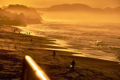 Scenic view of sea against sky during sunrise