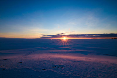 Scenic view of landscape against sky during sunset