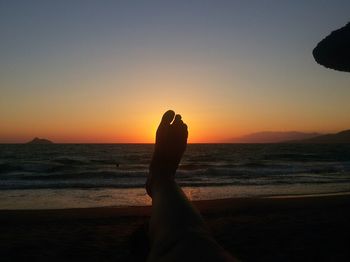 Scenic view of sea at sunset