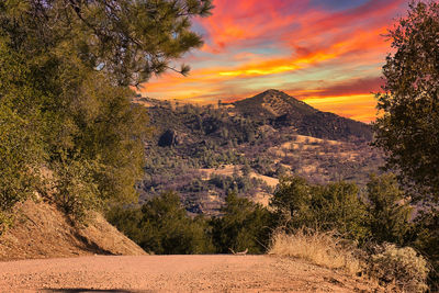 Scenic view of landscape against sky during sunset