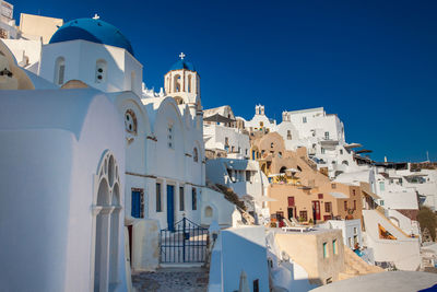 Traditional architecture of the churches of the oia city in santorini island