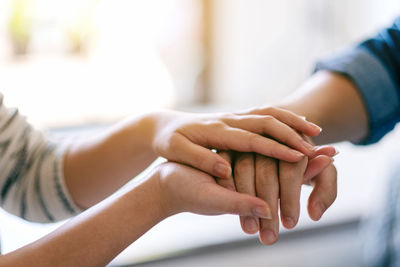 Close-up of woman consoling man