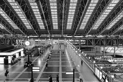 High angle view of people walking at train station