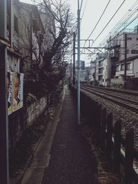 Railroad tracks against sky