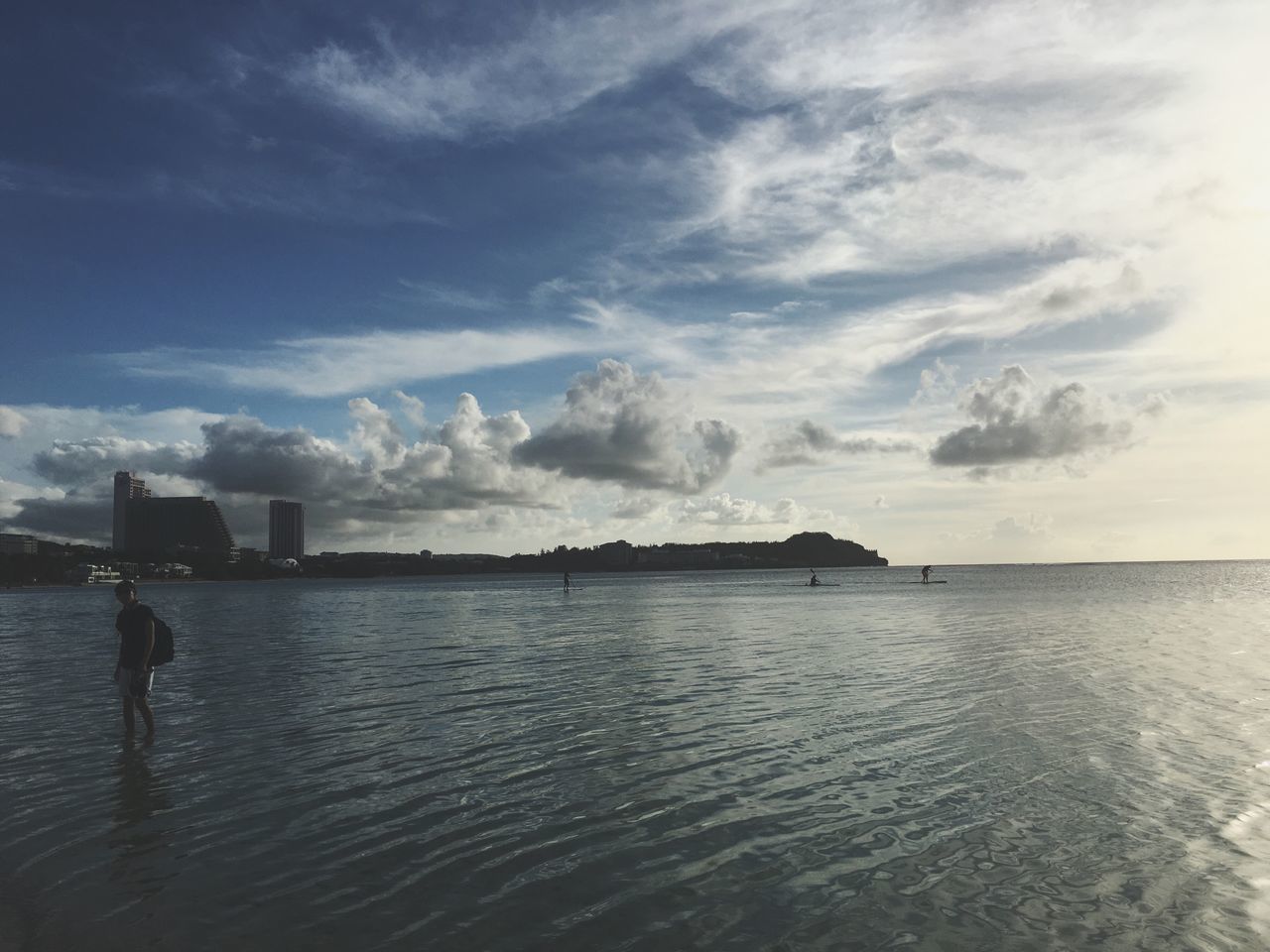 water, sky, sea, waterfront, cloud - sky, tranquility, tranquil scene, horizon over water, scenics, rippled, cloud, nature, beauty in nature, cloudy, built structure, building exterior, outdoors, day