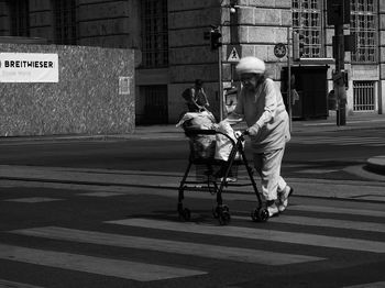 Man with umbrella on street