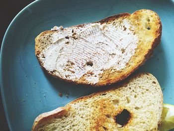 Buttered, toasted bread on plate