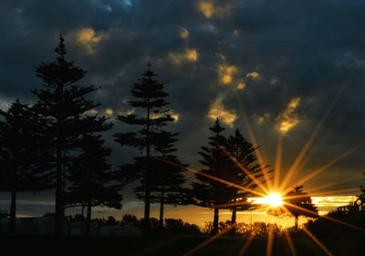 Sun shining through clouds