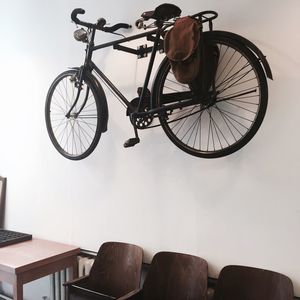 Bicycle mounted on wall