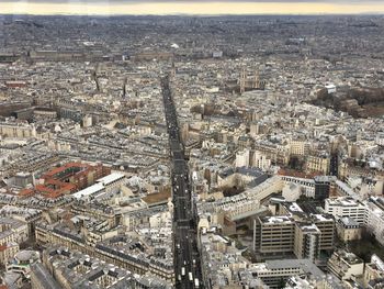 High angle view of crowd and buildings in city