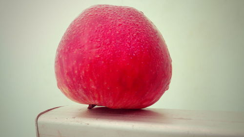 Close-up of apple against white background