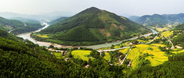 High angle view of agricultural field against mountains