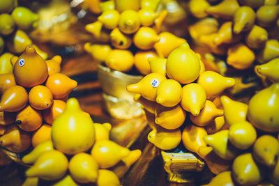 Close-up of yellow fruits for sale at market stall