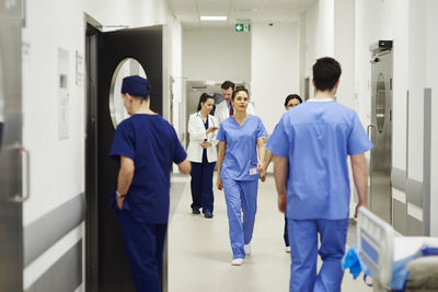 Doctors walking in corridor at hospital