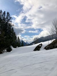 Snow covered mountain against sky