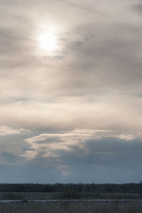 Scenic view of field against sky during sunset