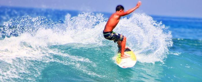 Man surfing in sea