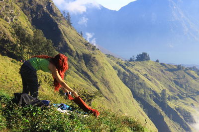 Man looking at mountain