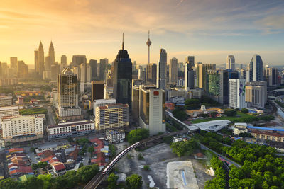 View of cityscape against sky during sunset