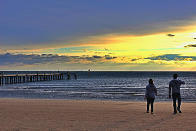 Scenic view of sea at sunset