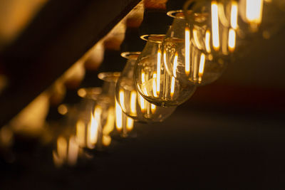 Close-up of illuminated light bulb