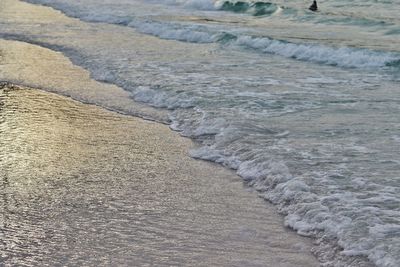 Surface level of waves rushing towards shore