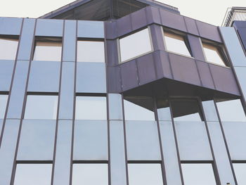 Low angle view of modern building against sky