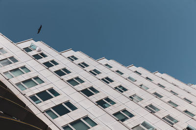 Low angle view of building against blue sky