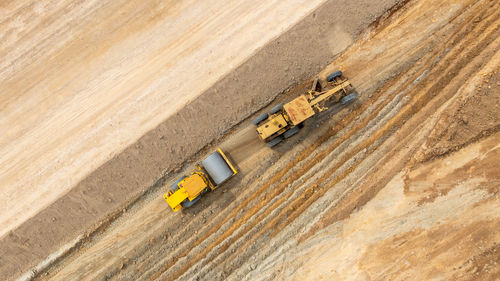 Aerial view motor grader civil at construction site, motor grader work on construction site, road