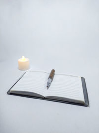 High angle view of book on table