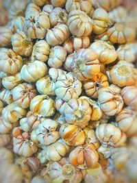 Full frame shot of onions for sale in market