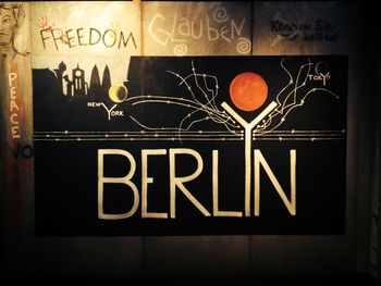 Close-up of text on wall