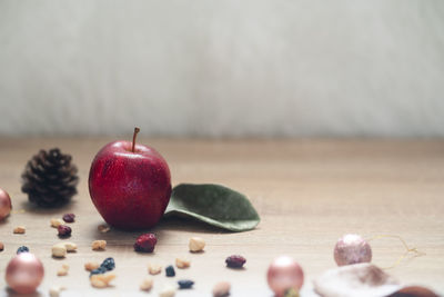 Close-up of apples on table at home
