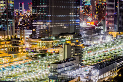 High angle view of illuminated cityscape at night