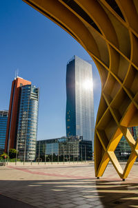 Modern buildings against blue sky