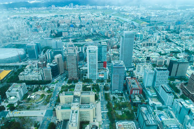 High angle view of modern buildings in city