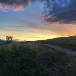 Scenic view of landscape at sunset