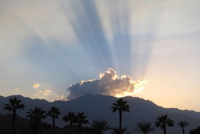 Scenic view of mountains against sky during sunset