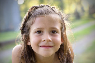 Close-up portrait of smiling girl