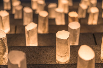 Handmade japanese paper washi lanterns illuminating the stone steps of the zojoji temple.