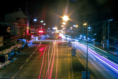 Light trails on city street at night