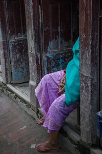 Man with umbrella in abandoned building