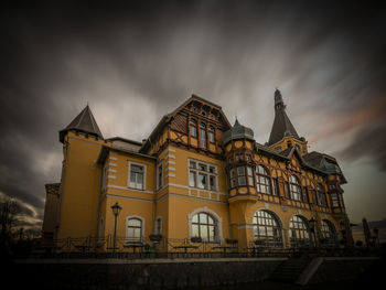 Low angle view of old building against sky