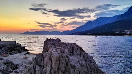 Scenic view of sea at sunset