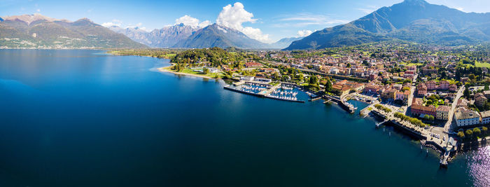 Scenic view of lake by mountain against sky