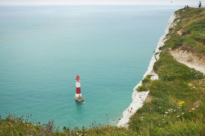 White chalk headland cliffs and beachy head lighthouse. seven sisters, east sussex, uk.