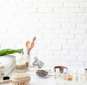 Close-up of food on table against wall