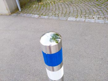 High angle view of drink on sidewalk