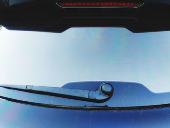 Close-up of reflection of car on water