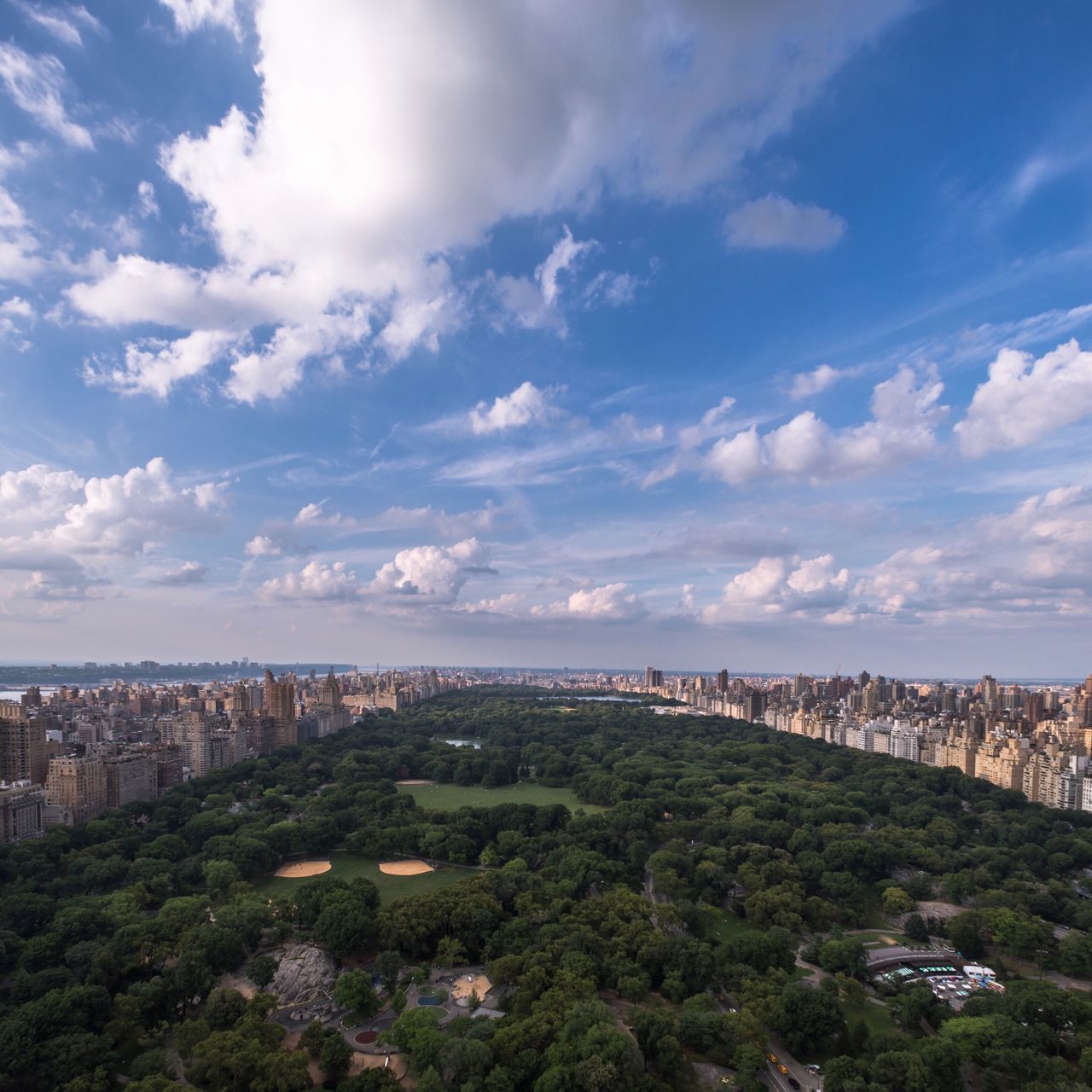 building exterior, cityscape, architecture, built structure, tree, high angle view, sky, city, crowded, cloud - sky, landscape, residential district, aerial view, cloud, residential building, nature, residential structure, day, scenics, outdoors